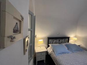 Letto o letti in una camera di Emmantina