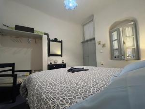 Letto o letti in una camera di Emmantina