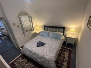 Letto o letti in una camera di Emmantina