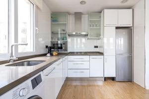 Kuchyňa alebo kuchynka v ubytovaní Atocha FreshApartments