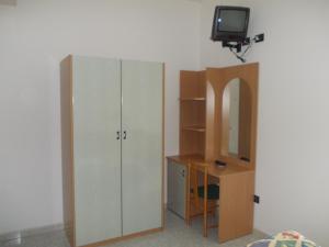 TV a/nebo společenská místnost v ubytování Scacco Rosso