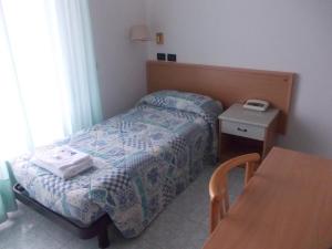 Postel nebo postele na pokoji v ubytování Scacco Rosso