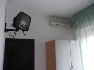 TV a/nebo společenská místnost v ubytování Scacco Rosso