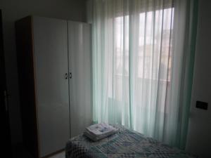 Postel nebo postele na pokoji v ubytování Scacco Rosso