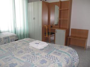 Postel nebo postele na pokoji v ubytování Scacco Rosso