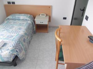 Postel nebo postele na pokoji v ubytování Scacco Rosso