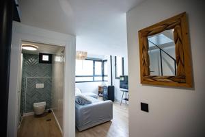 Postel nebo postele na pokoji v ubytování Holidays, Duplex para 4, Gorbea