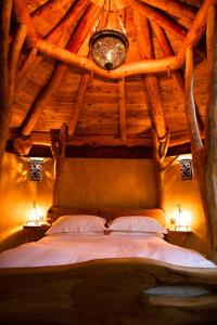 Ένα ή περισσότερα κρεβάτια σε δωμάτιο στο Little Hollows Glamping