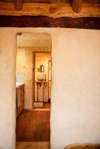 a view of a room with a kitchen and a hallway at Little Hollows Glamping in Little Malvern