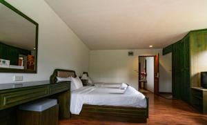 Voodi või voodid majutusasutuse Chaweng Tara Hotel toas