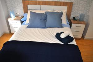 Łóżko lub łóżka w pokoju w obiekcie Apartamento Gran Torcal