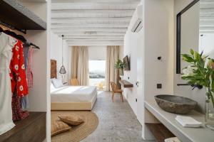 Voodi või voodid majutusasutuse Ubud Mykonos toas
