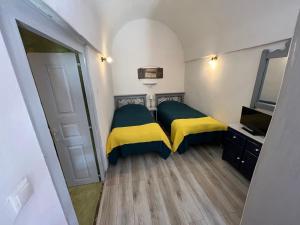 Letto o letti in una camera di Emmantina