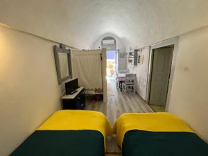 Letto o letti in una camera di Emmantina