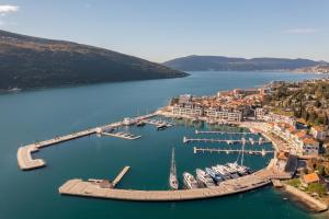 an aerial view of a harbor with boats in the water at Portonovi Resort in Herceg-Novi
