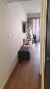 a room with a bed and a sink in it at Bandol and Beach pour 2 à 3 personnes in Bandol +12 photos