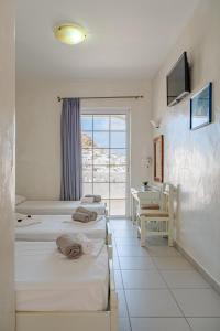 Postel nebo postele na pokoji v ubytování Sunrise Hotel + 37 fotografií