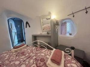 Letto o letti in una camera di Emmantina
