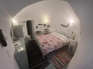 Letto o letti in una camera di Emmantina