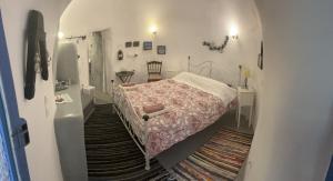 Letto o letti in una camera di Emmantina