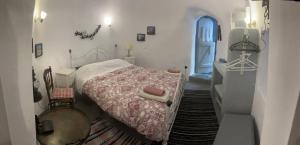 Letto o letti in una camera di Emmantina