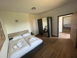 Postel nebo postele na pokoji v ubytování Active Chillax Oasis Apartments