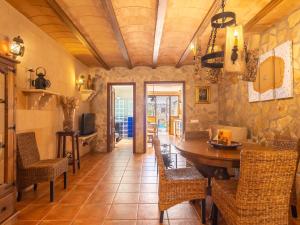 a dining room with a table and chairs at Holiday Home Pueblo - PSR175 by Interhome in Porreres