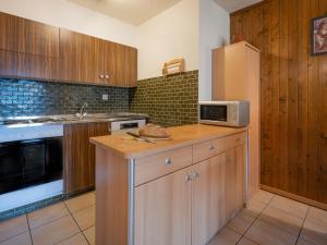 Kuchyň nebo kuchyňský kout v ubytování Apartment Domino B 48 by Interhome + 16 fotografií