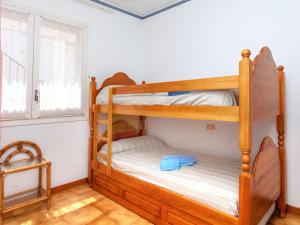 Postel nebo postele na pokoji v ubytování Apartment Nicolas by Interhome