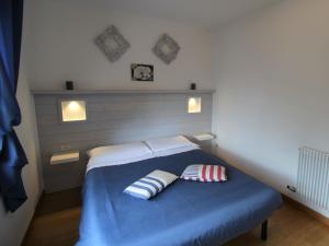 Postel nebo postele na pokoji v ubytování Holiday Home Rosemarie by Interhome