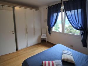 Postel nebo postele na pokoji v ubytování Holiday Home Rosemarie by Interhome