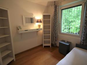 Postel nebo postele na pokoji v ubytování Holiday Home Rosemarie by Interhome