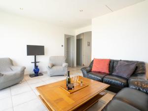 Posezení v ubytování Villa Les 4 Vents by Interhome