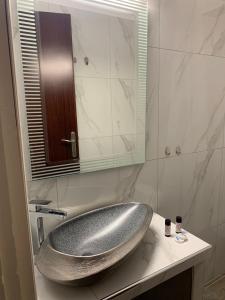 Koupelna v ubytování Kokkala Guestrooms + 37 fotografií