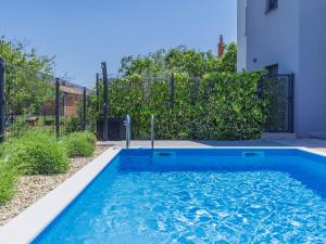 Bazén v ubytování Holiday Home Villa Isabela by Interhome nebo v jeho okolí