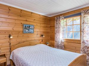 Postel nebo postele na pokoji v ubytování Holiday Home 7734 by Interhome