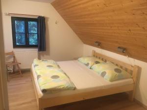 Postel nebo postele na pokoji v ubytování Holiday Home Holiday Hill 63 by Interhome