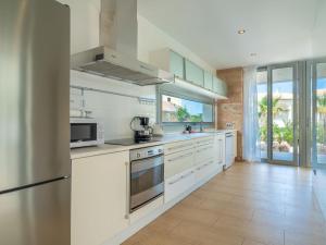 A kitchen or kitchenette at Villa Villa Mut by Interhome