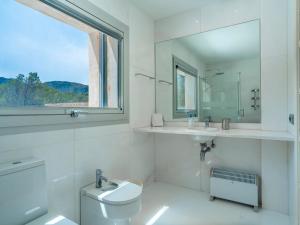 A bathroom at Villa Villa Mut by Interhome