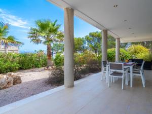 A garden outside Villa Villa Mut by Interhome