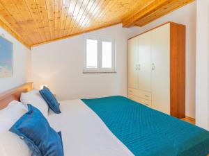 Postel nebo postele na pokoji v ubytování Apartment Maja-1 by Interhome