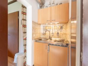 Kuchyň nebo kuchyňský kout v ubytování Apartment Am Hohen Bogen-65 by Interhome + 22 fotografií