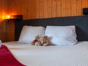 Ένα ή περισσότερα κρεβάτια σε δωμάτιο στο Chalet Dolce Cabane by Interhome