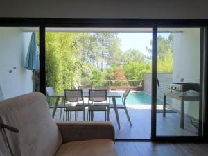 Bazén v ubytovaní Apartment Les Jardins d'Ève-F2 by Interhome alebo v jeho blízkosti