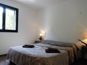 Posteľ alebo postele v izbe v ubytovaní Apartment Les Jardins d'Ève-F2 by Interhome