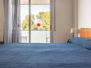 Posteľ alebo postele v izbe v ubytovaní Apartment Aquaria Atico by Interhome