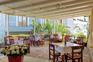 Un restaurante o sitio para comer en Hotel Milo Ksamil