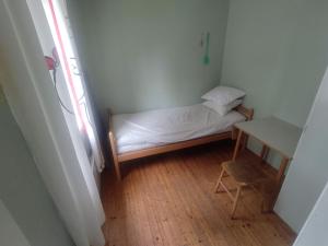 Postel nebo postele na pokoji v ubytování Selholmens Camping