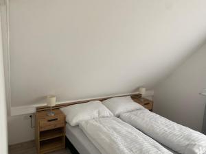 Postel nebo postele na pokoji v ubytování SunSet Beach Apartman