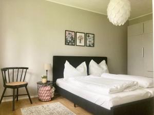 A bed or beds in a room at Gartenhaus5